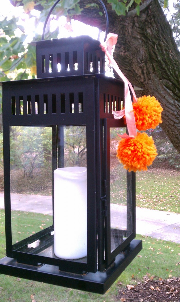 poms on lantern