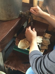 filling syrup bottles