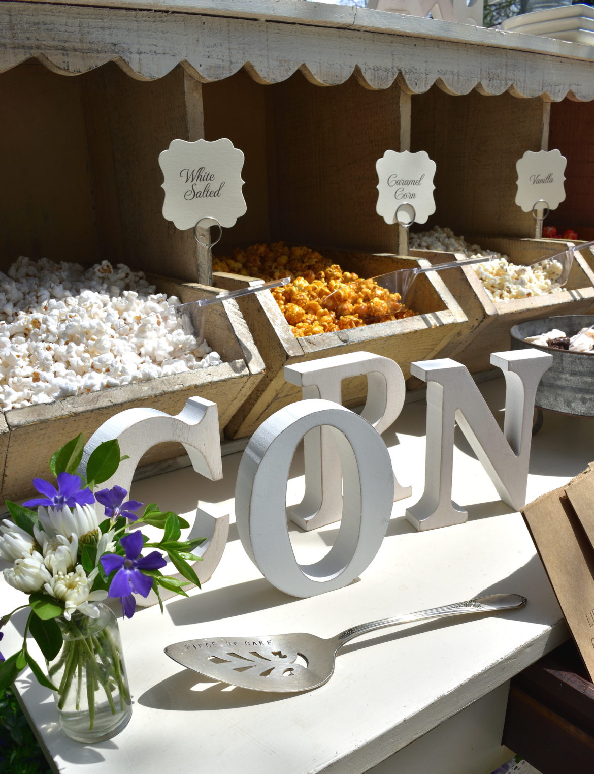 A popcorn bar perfect for a rustic wedding! See all the sweet details!